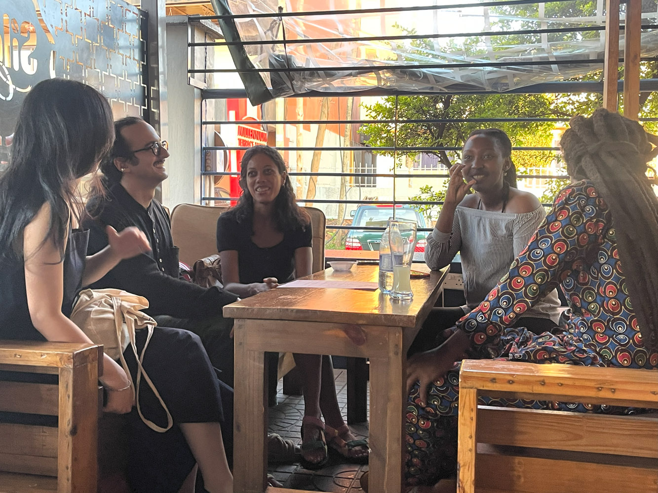 Happy and diverse Silent Café staff members smiling together